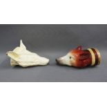 Rare Creamware fox head stirrup cup, restored with losses, together with another with coloured
