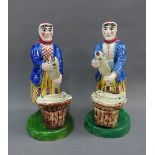 Pair of East Coast, Scottish pottery, perhaps Portobello, Newhaven style fishwife figures, each is