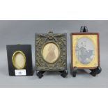 Daguerreotype, framed silhouette and an ebonised frame, (3)