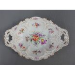 Continental porcelain oval dish, the white ground with handpainted floral sprays and gilt edged rim,