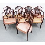 Set of eight George III style open armchairs in the manner of Sheraton, with shield backs and
