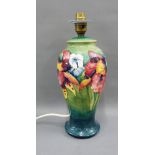 Moorcroft Pottery baluster table lamp base, with green ground and tubeline flowers, 27cm high
