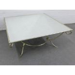 Julian Chichester 'Larsen' glass topped coffee table on scrolling silvered metal legs, 52 x 120cm