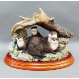 Border Fine Arts, Otter Family group on an oval plinth base, 21cm long