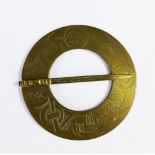 Early Scottish brass plaid brooch with engraved celtic knotwork pattern, 11.5cm