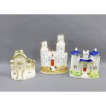 Three Staffordshire castle and house figures, tallest 21cm (3)