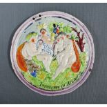 Innocence in Arcadia moulded circular pearlware plaque with a purple lustre rim, 17cm diameter