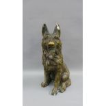 Bronze patinated metal figure of a seated dog, with impressed backstamp, 30cm high