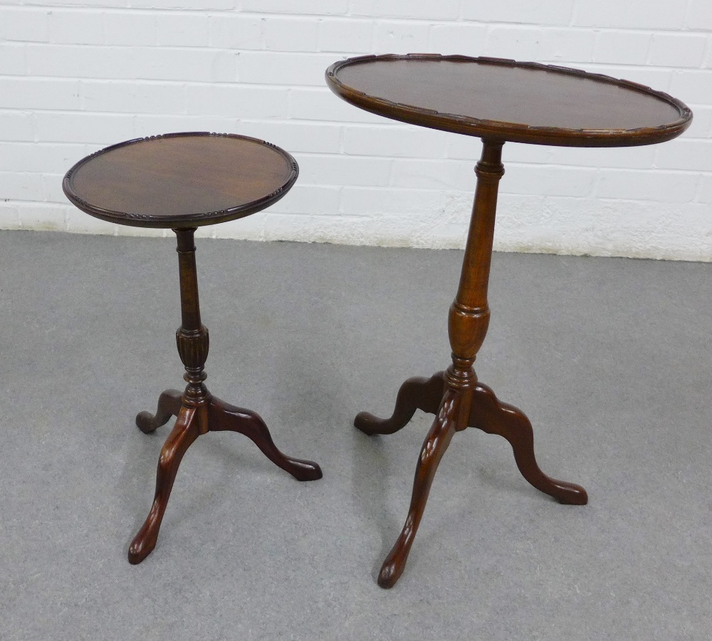 Mahogany pedestal wine table on a baluster column together with another, tallest 63 x 44cm (2)