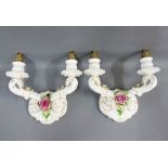 A pair of German floral encrusted wall applique, 25cm wide 92)