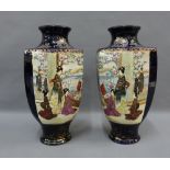Pair of Japanese Satsuma style hexagonal baluster vases, painted with figures in a garden setting
