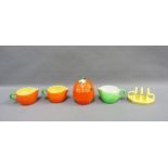 Carlton Ware orange glazed honey pot and three jugs together with a Myott & Son yellow glazed