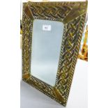 Brass framed celtic knot mirror with rectangular bevelled plate, 30 x 44cm