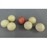Seven late 19th / early 20th century ivory billiard balls, (7)