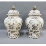 Pair of India Jane grey glazed temple jars and covers with elephant and flower pattern, 41cm high