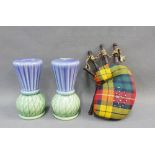 Pair of pottery thistle shaped salt and pepper pots and a novelty tartan bagpipe pin cushion, (3)