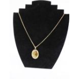 9ct gold locket on a 9ct gold rolo chain