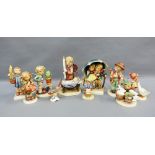 Collection of ten Hummel figures and a Goebel bird, tallest 17cm (11)