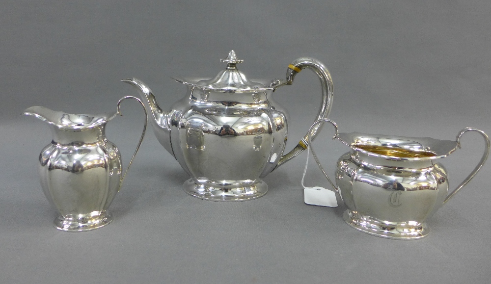 George V silver teaset, Atkin Brothers, Sheffield 1916,comprising teapot, cream jug and twin handled