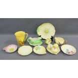 Carltonware fruit and flower pottery to include a yellow glazed mug, cruet set, napkin ring, cream
