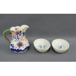 Octagonal Gaudy Welsh type jug with moulded handle and a pair of blue and white oval pottery dishes,