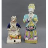 Staffordshire pottery figure and a Chinese figurine, tallest 18cm (2)