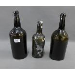 Three vintage green glass wine bottles, (3)