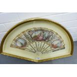 Antique handpainted fan with ivory guards, contained within a glazed fan showcase, the size of the