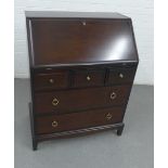 Stag Minstrel secretaire chest, with fall front, three short and two long drawers, 99 x 76cm