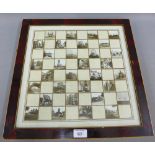 Glass chess board containing a black and white topographical scenes to include Franco British