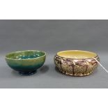 Moorcroft pottery irises pattern bowl and a Wedgwood copper lustre bowl, largest 15cm diameter (2)