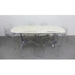 B&B Italia Maxalto dining table with a white marbled hardstone top and chrome X frame supports, 74 x