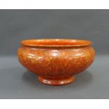 Pilkingtons Royal Lancastrian bowl with an orange mottled glaze, impressed factory backstamps and