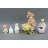 Mixed lot to include an Austrian bisque figure, two porcelain candle snuffers, boy figure with