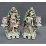 A pair of late 18th / early 19th century male and female bocage figures / candelabra, some damages