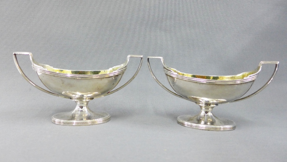 A pair of George III silver gilt salts, John Emes, London 1804, of twin handled navette shape, on - Image 2 of 3