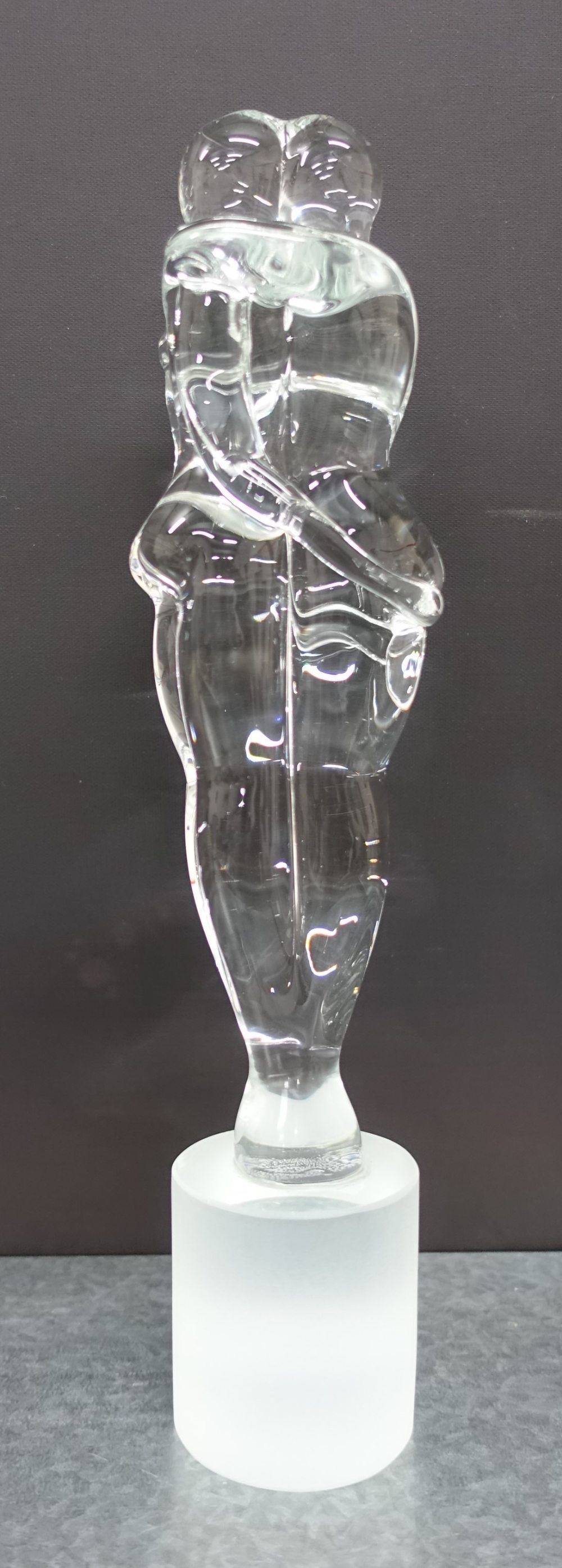 Art glass sculpture of two figures, signed to the base indistinctly, 28cm high