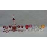 Coloured glass liqueur set with decanter and stopper and set of five glasses and a set of six