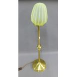 Brass lamp with yellow opaque glass shade, height overall 90cm