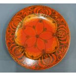 William S. Mycock for Pilkingtons Royal Lancastrian orange flambe glazed charger with stylised