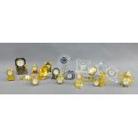 Collection of thirty two miniature brass and glass clocks (32)