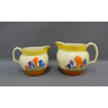 Clarice Cliff, Bizarre, Crocus patterned jugs, tallest 15cm (2)