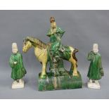 Chinese Tang style figures to include a horse and rider and two standing figures, with