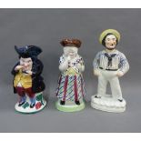 Staffordshire figure of a sailor, female snuff taking Toby jug and a male Toby jug, possibly