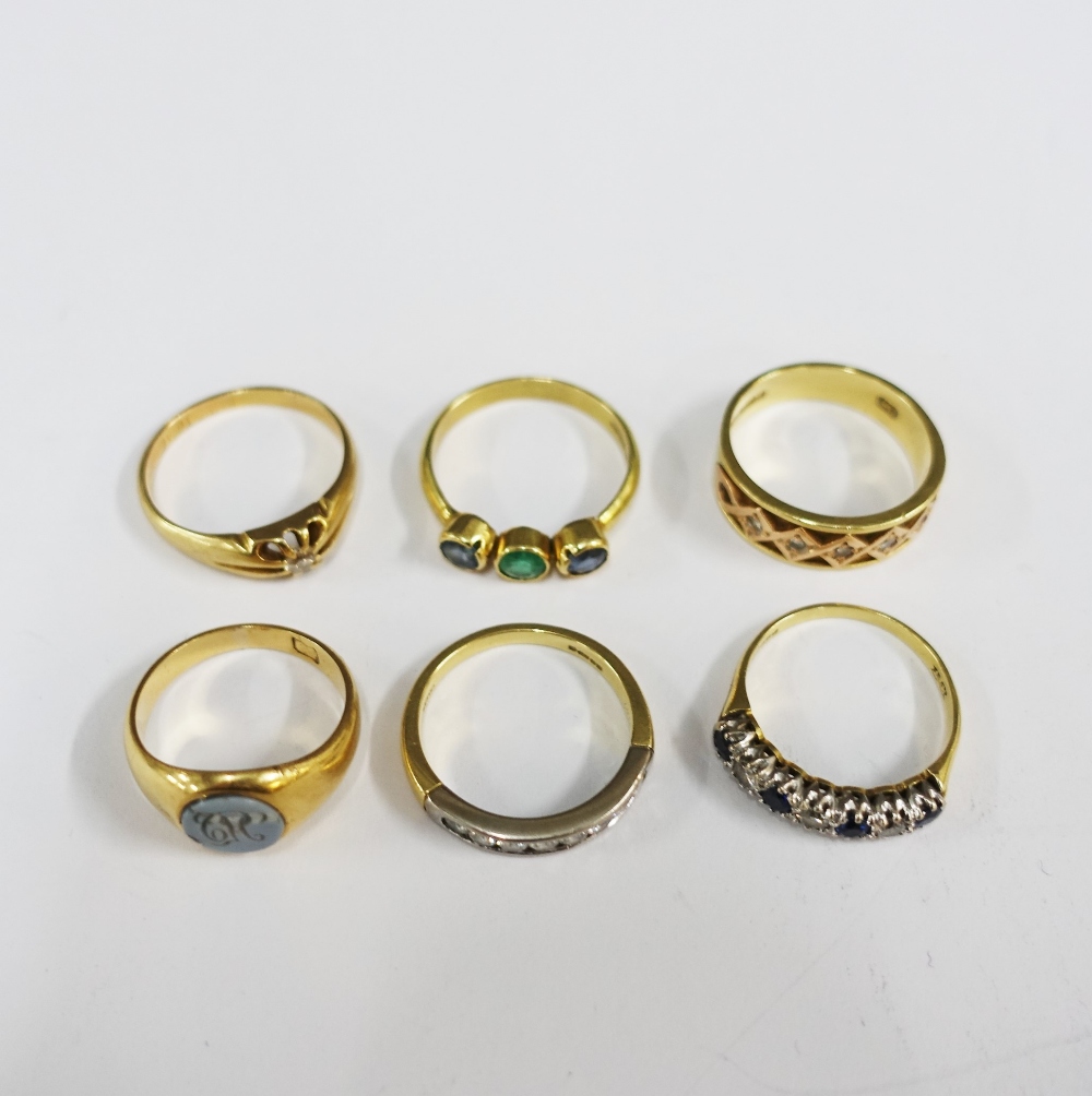 A collection of six 18ct gold gemset rings (6)