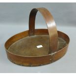 Oval wooden basket with a flat base and central handle, 45cm long