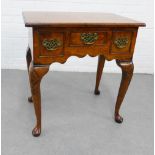 Walnut lowboy with three small drawers on shell carved cabriole legs with pad feet, 73 x 69cm