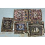 Four Eastern carpet saddle bags (4)