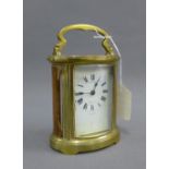 French brass and glass panelled carriage clock, the dial with Roman numerals and inscribed Brook &