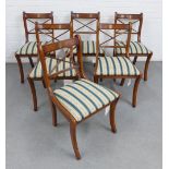 Set of six yew wood dining chairs with upholstered slip in seats and sabre legs, in unused new